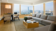 Suite living area at Upper House Hong Kong with views over the harbour